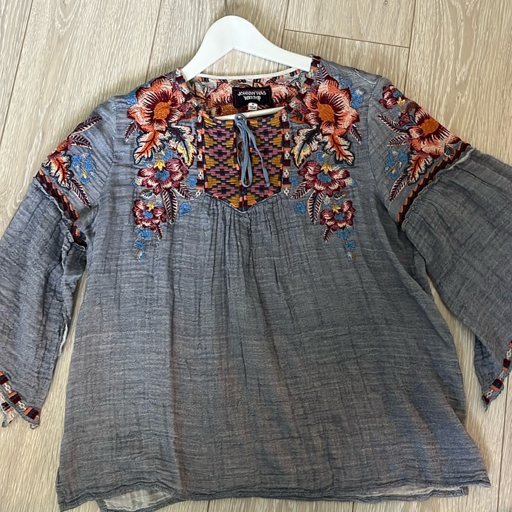 Johnny Was flowey blouse light blue with intricate embroidery all over.